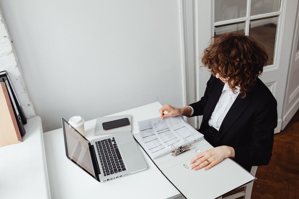 Individual reviewing year-end tax documents