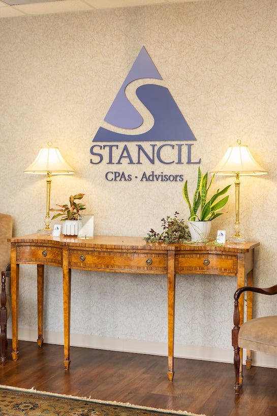 Reception area at Stancil CPA featuring the firm's logo.