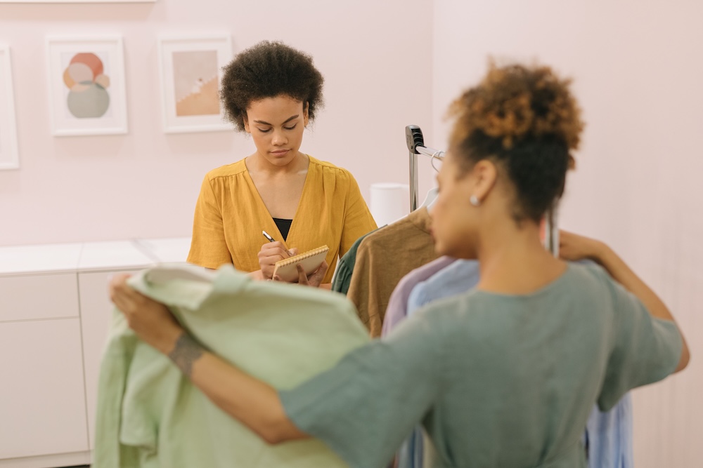 employee and business owner taking stock of items