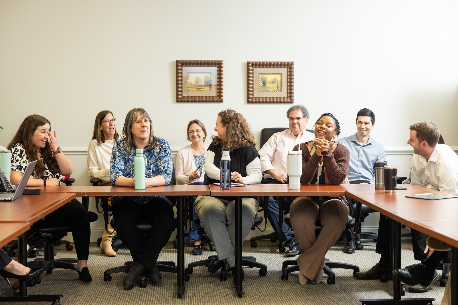 The Stancil CPA team collaborating and sharing ideas during an office meeting in Raleigh, North Carolina.