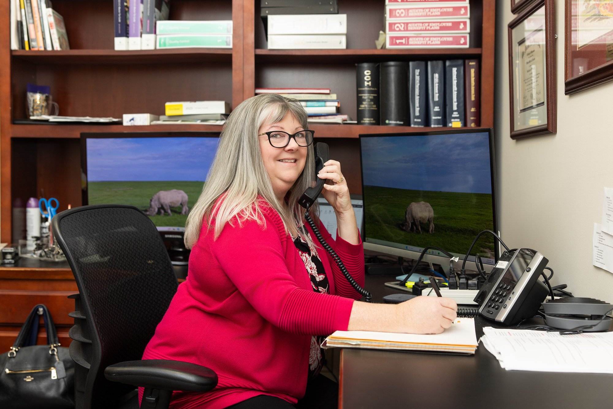 Team member speaking with a client on the phone at Stancil CPA.
